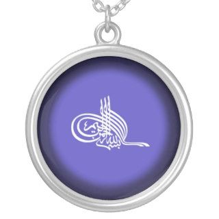 Islamic necklace with Bismillah on blue background