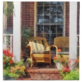 Wicker Chair With Striped Pillow Napkin