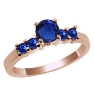 0.87 Ct Round Blue Created Sapphire Sapphire 14K Rose Gold Engagement Ring: Jewelry