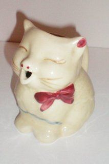 Shawnee Puss n Boots Creamer marked PATENTED Puss'n Boots USA    yellow variety    4.5" tall : Other Products : Everything Else