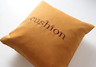 it does what it says on the tin cushion by susiemaroon