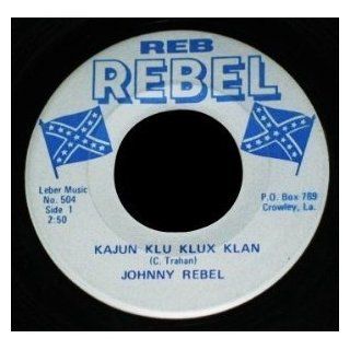 Kajun Klu Klux Klan/ Looking For A Handout. 45 rpm: Music