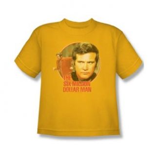 The Six Million Dollar Man   Run Faster Youth T Shirt In Gold: Clothing
